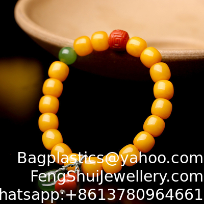 Buen precio Joyería de moda rosquilla redonda amarillo ámbar amarillo natural Piebald ámbar brazalete purificación de agua moda flores cuentas redondas fábrica venta directa en línea