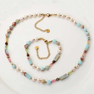 Bon prix La pierre naturelle pour les femmes La pierre de Shoushan Les perles de cristal multicolore Le bracelet Le collier Petit cylindre Le collier de pierre naturelle Le collier en acier inoxydable Les perles d'or Le collier en perles Pour les femmes en ligne