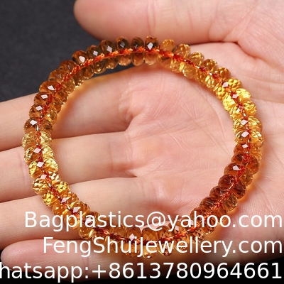 Ein guter Preis. Natürliches brasilianisches gelbes Kristall-Armband Schnitt-Fassett-Fassett-Gelätsch-Armband Männer und Frauen Ring Grade Deep Orange Online