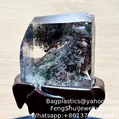 Bon prix Cristal naturel Fantôme rouge et vert pierre de paysage pierre ornementale mille couches de montagne trésor vert fantôme Jewelrye fantôme ornementation en pierre d'origine en ligne