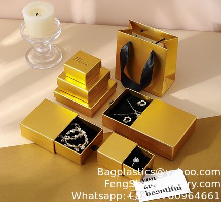 Bon prix Boîte d'emballage de bijoux en or personnalisable en gros, luxe léger, papier spécial, couvercle supérieur et inférieur, boîte rigide coulissante pour bague, boîte de rangement à tiroir pour bijoux en ligne